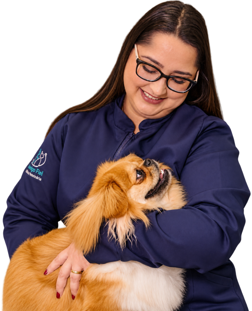Dra Carol com o mascote Fiel no colo.
